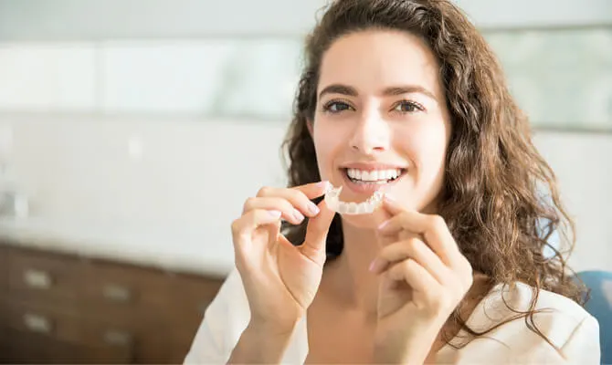 Invisible Braces vs. Metal Braces: Pros and Cons